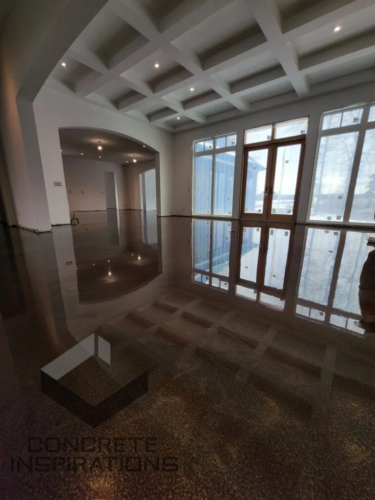 High-end 6000 sq ft metallic epoxy floor installation in residential home in Calgary