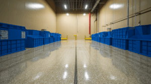 Top 7 Benefits of using epoxy Warehouse image with industrial epoxy flooring